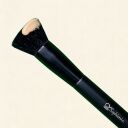 The Sophienia flat-top foundation brush features black bristles and a black handle, with its brush head coated in a beige liquid foundation product.