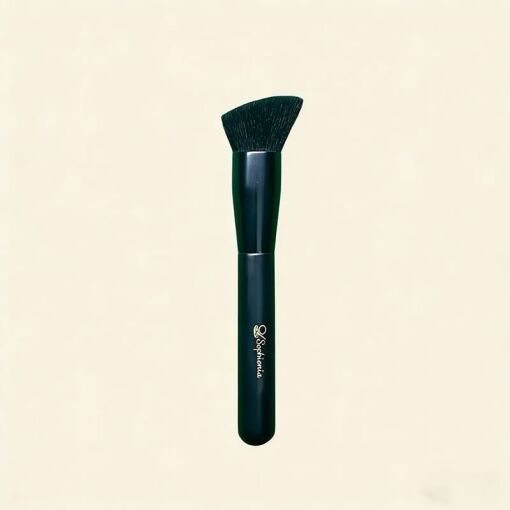 Sophiena angled contour makeup brush with dark green handle and dense black bristles on cream background