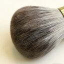 A soft fox and goat hair natural hair makeup powder brush with a gold metal tube; close-up shots show the dense texture of the bristles.